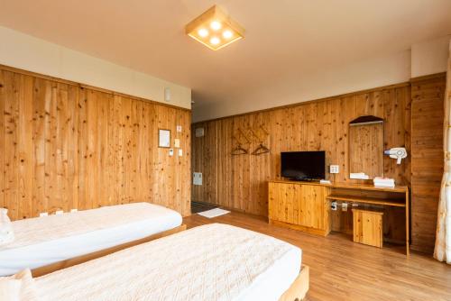 Postel nebo postele na pokoji v ubytování Galeum Guesthouse