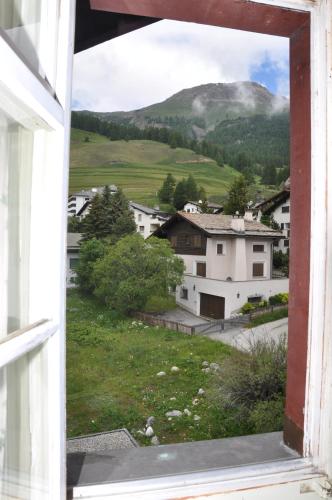 a view from a window of a village at Chalet Speciale - Celerina in Celerina