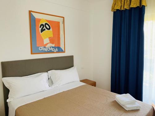 Postel nebo postele na pokoji v ubytování Front Lake Apartment Bardolino