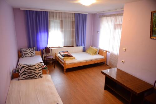 Postel nebo postele na pokoji v ubytování Delieva House