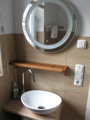 Ett badrum på Business Lounge Potsdam