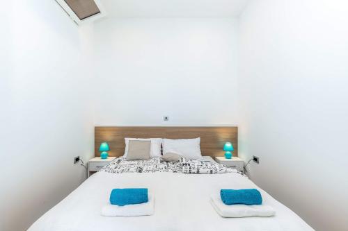 Posteľ alebo postele v izbe v ubytovaní Julia apartments