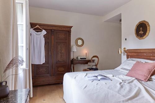 Ein Bett oder Betten in einem Zimmer der Unterkunft Castello Fai