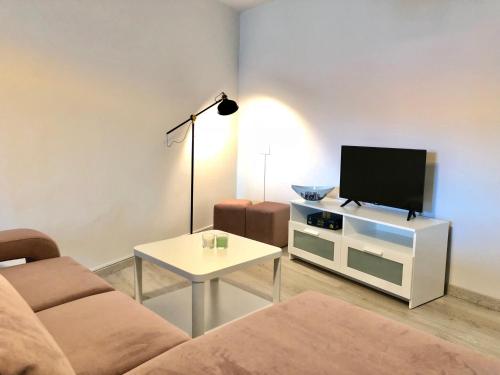 TV a/nebo společenská místnost v ubytování Casa Xuncal