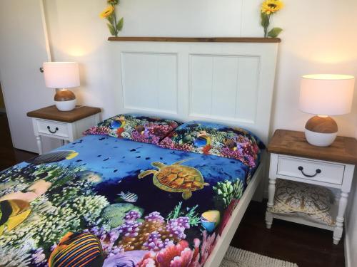 Ένα ή περισσότερα κρεβάτια σε δωμάτιο στο Golden Sands Beach House