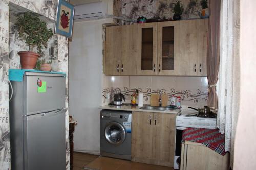 Kuchyň nebo kuchyňský kout v ubytování Grandma`s Hotel