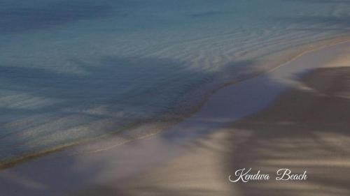 a view of a body of water from an airplane at Mocco Beach Villa in Kendwa