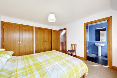 Ένα ή περισσότερα κρεβάτια σε δωμάτιο στο The Arches, Borthwick Mains Farm,