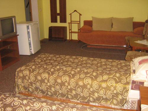 Кровать или кровати в номере Villa Veselka