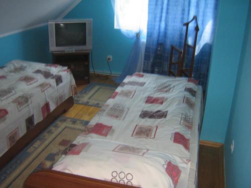 Кровать или кровати в номере Villa Veselka