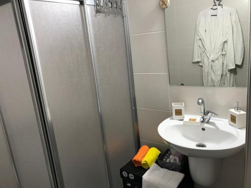 a bathroom with a sink and a shower at Cozy Flat in the heart of North Nicosia --- 55-1 in North Nicosia