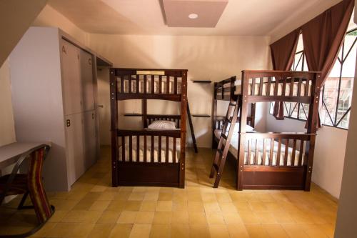 Postel nebo postele na pokoji v ubytování Casa de Juan Hostal