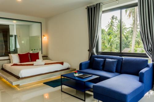 Postel nebo postele na pokoji v ubytování Am Samui Resort Taling Ngam