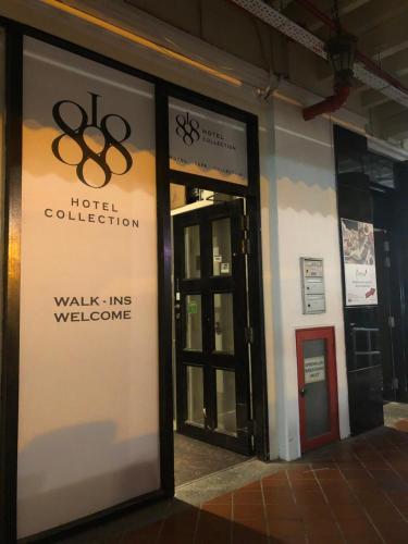 a door to a hotel with a walk in doorway at Rest Chinatown Hotel in Singapore