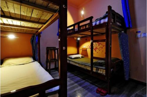 Postel nebo postele na pokoji v ubytování Shu Hostel