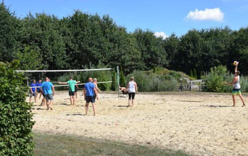 a group of people playing a game of volleyball at Ferienresort Texas MV in Kirch Jesar