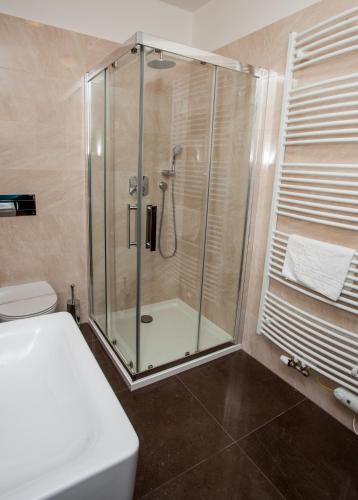 Ванная комната в Rezidence Moser Apartments