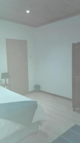 Guest Lodge on the Edgeにあるベッド