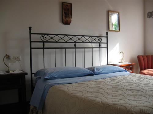 Ένα ή περισσότερα κρεβάτια σε δωμάτιο στο B&B Prisca