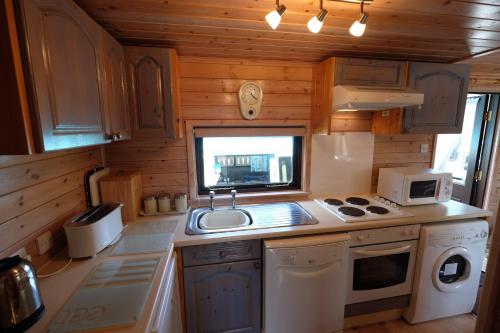 Kuchyň nebo kuchyňský kout v ubytování Fellside Lodge