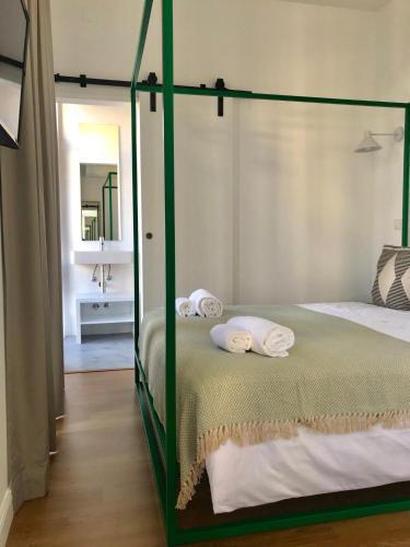Postel nebo postele na pokoji v ubytování Alameda Exclusive House