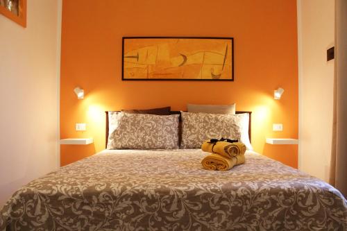 Letto o letti in una camera di Il Giardino di Laura Private Rooms Mondello