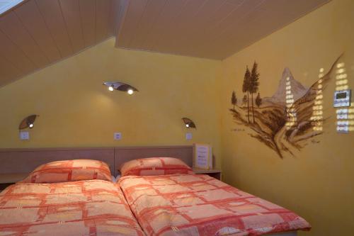 Postel nebo postele na pokoji v ubytování Relais de la Sarvaz