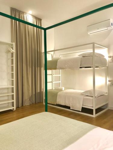 Postel nebo postele na pokoji v ubytování Alameda Exclusive House