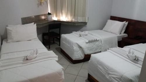 Katil atau katil-katil dalam bilik di Hotel Real