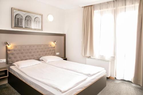 Katil atau katil-katil dalam bilik di Hotel Niky