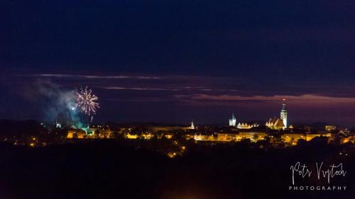 a city with fireworks in the sky at night at Luxurious, lovely and romantic apartment in Tabor in Tábor