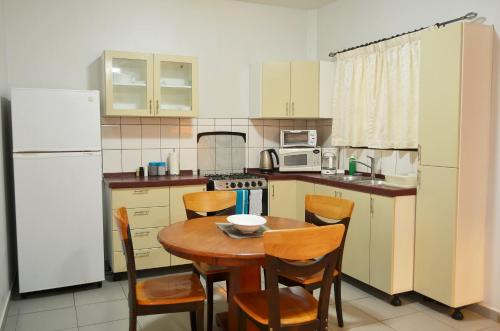 A kitchen or kitchenette at Rachel's Apartments