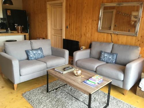 Ruang duduk di The Orchard Bramble Lodge