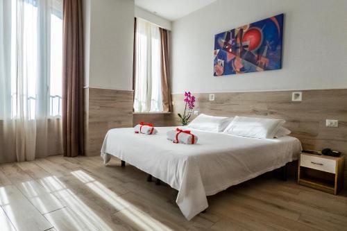 Ένα ή περισσότερα κρεβάτια σε δωμάτιο στο Eurohotel