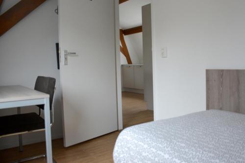 Ένα ή περισσότερα κρεβάτια σε δωμάτιο στο Short Stay Wageningen
