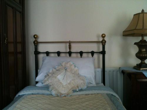 Letto o letti in una camera di Charlemont House Moy