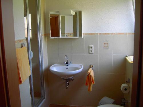 Ванна кімната в Ferienwohnung Sonnenlay