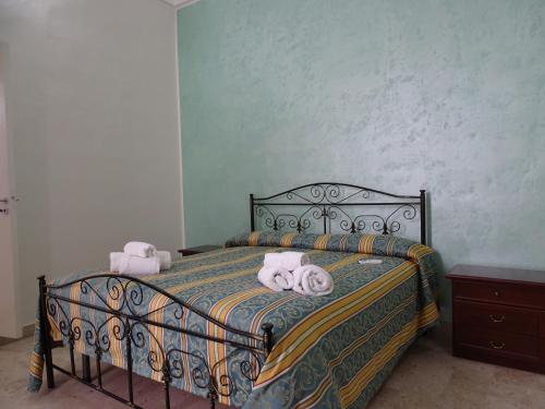 Postel nebo postele na pokoji v ubytování b&b new antico palazzo