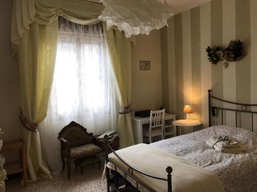 Posteľ alebo postele v izbe v ubytovaní Casa Giulietta