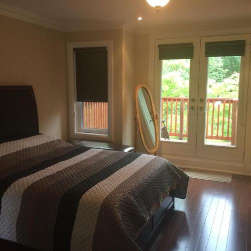 Letto o letti in una camera di Luxury Home - Upper Toronto Beaches