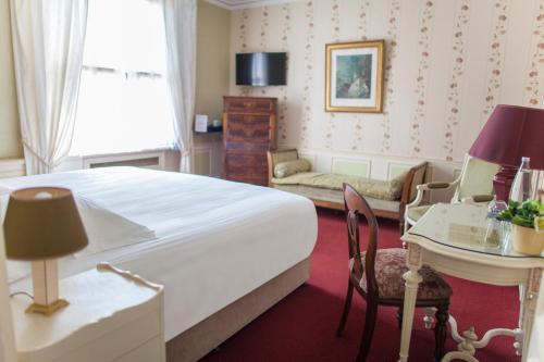 Katil atau katil-katil dalam bilik di Hotel Meurice