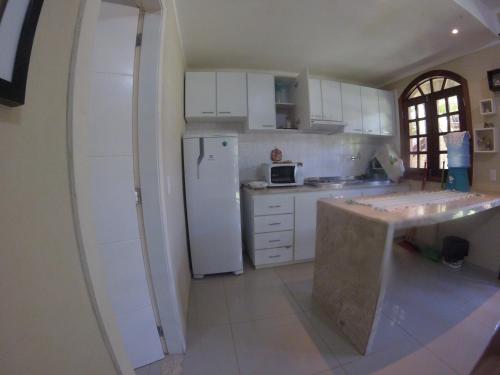 Dapur atau dapur kecil di Flat La Fazenda