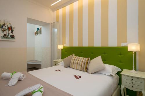 Ένα ή περισσότερα κρεβάτια σε δωμάτιο στο Zefiro Home