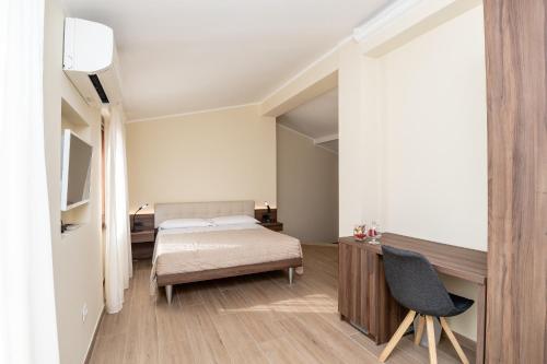 Cama o camas de una habitación en Scaligero Rooms