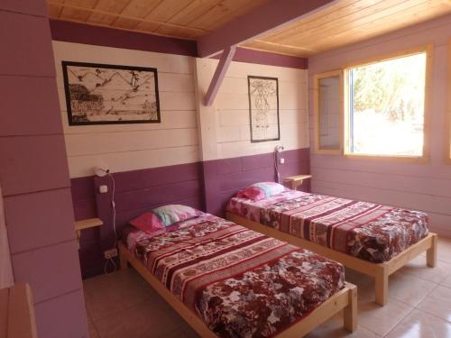 Una cama o camas en una habitación de Casa Madeira