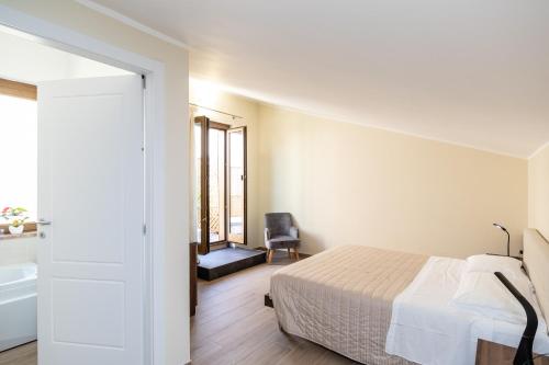 Cama o camas de una habitación en Scaligero Rooms