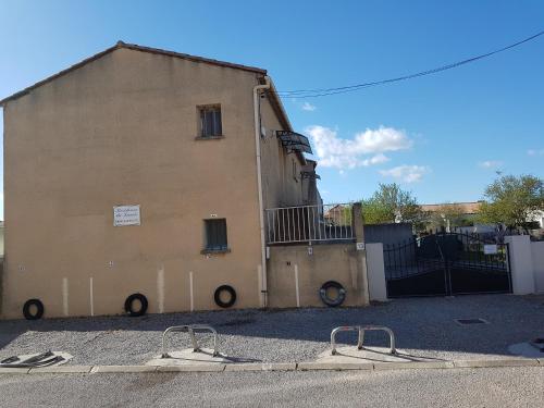 a building with two ramps in front of it at studio Rue du Lavoir in Balaruc-les-Bains