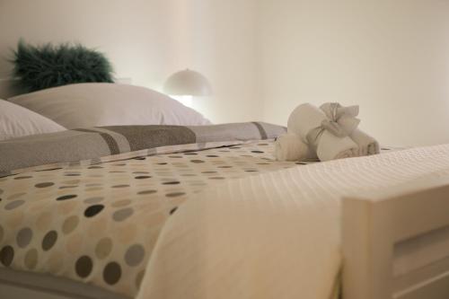 a close up of two beds with pillows at Apartments Gacka Valley in Otočac