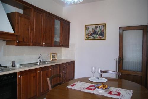 Kuchyňa alebo kuchynka v ubytovaní home paolina