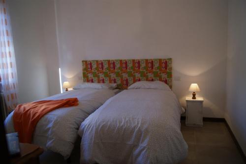 Ένα ή περισσότερα κρεβάτια σε δωμάτιο στο home paolina